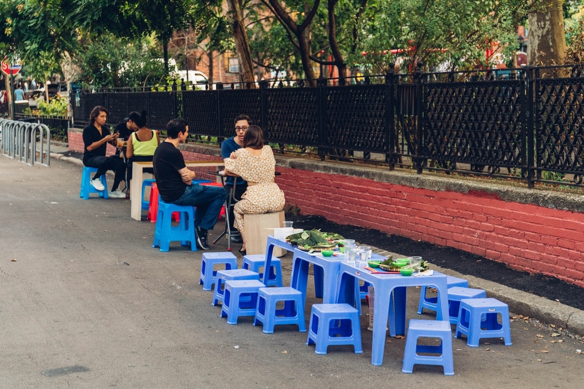 Bun dau mam tom stalls, with their plastic seats and bamboo trays, serve as a perfect representation of the casual spirit of Vietnamese street food culture